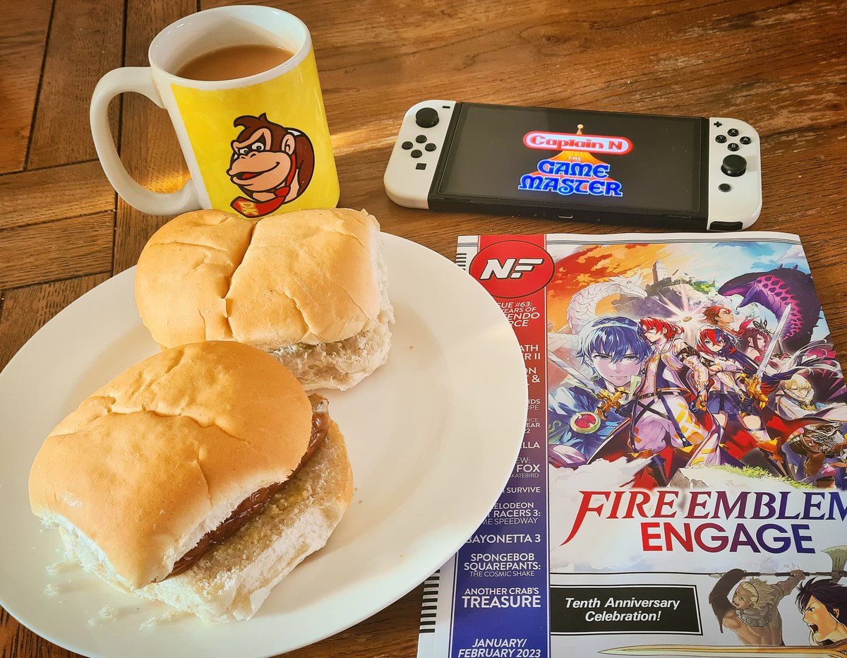 Woody26101's tweet photo. The 10 year anniversary issue of @NintendoForce turned up this morning and its my day off. Naturally, sausage cobs, cup of tea, episodes of #CaptainNtheGameMaster on my #NintendoSwitchOLED and a good read  of this are how this guys day off is starting! ✌️😁 #NintendoForceMagazine https://t.co/fnpzJVC3Mt