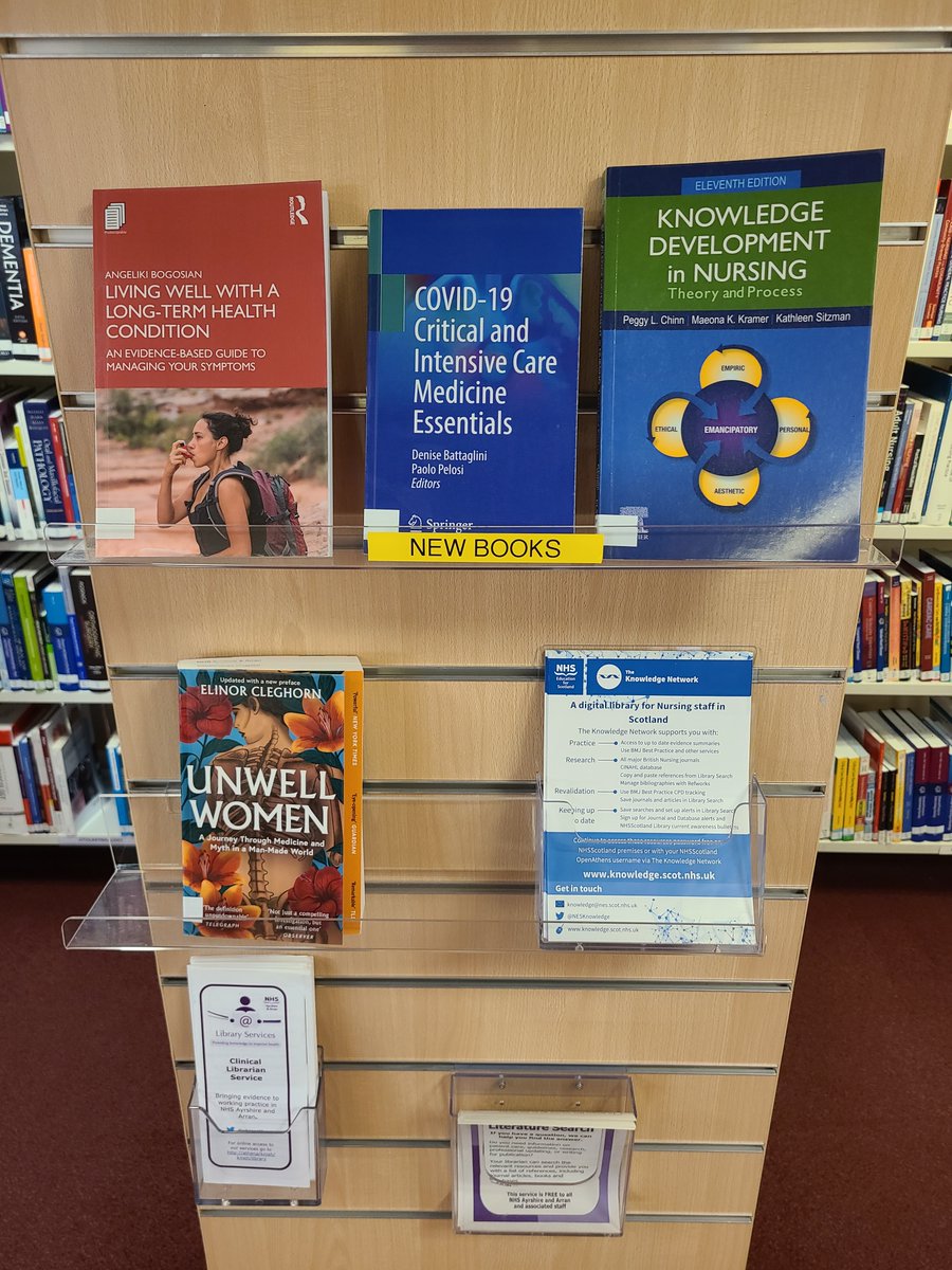 NHSAAALibrary's tweet photo. We've got so many new books at Crosshouse this week, we had to spread them out across the library. If, like our friend in the picture, you'll struggle to carry any you borrow, grab one of our library bags which are hanging on our lovely new self-issue machine.π#NewBookFriday https://t.co/OlBagfV4ut