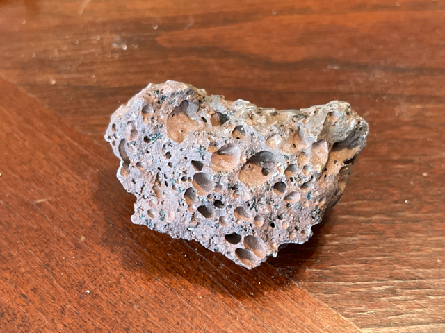 Pumice is a lightweight, light-colored rock found throughout the world. This rock is created when a volcano violently erupts and extremely hot, highly pressurized rock is expelled. This rock quickly cools, releasing the gases inside, creating a porous texture in the rock.