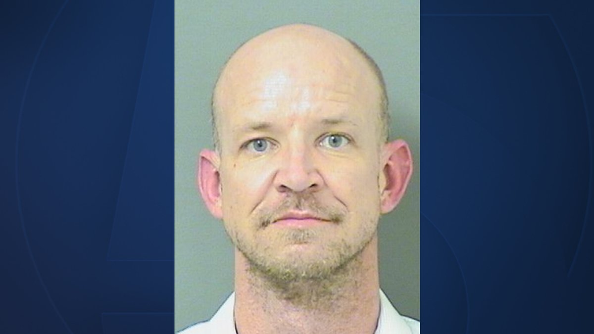 WPTV's tweet photo. #BREAKING: Royal Palm Beach teacher with gun at school says he was 'being watched' through phone, arrest report states https://t.co/fKMS5va6ra https://t.co/RUyUKIuVvK