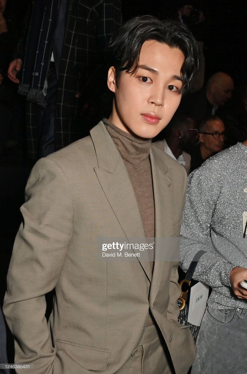 PARIS, FRANCE - JANUARY 20: Jimin of BTS attends the Dior Homme front row during Paris Fashion Week Menswear Fall-Winter 2023-2024 #JIMINxDIOR