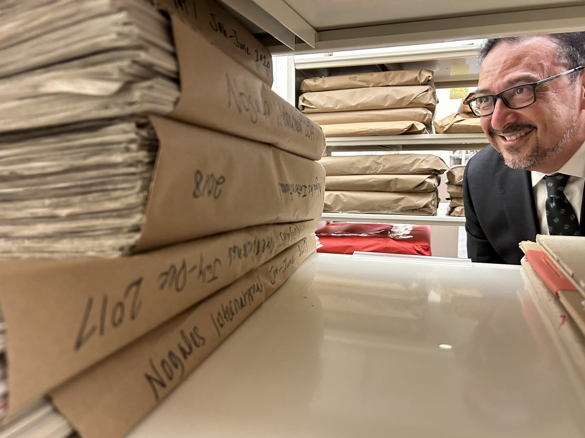 AZSecretary's tweet photo. Visiting the SOS staff at the Polly Rosenbaum Building, home to the state Library, Archives &amp; Public Records (LAPR). Pictured are 100 yrs worth of back issues of the Nogales newspaper, donated to LAPR by the @pahsmuseum Pimeria Alta Historical Society to add to LAPR collection. https://t.co/pgtOMRLDlA
