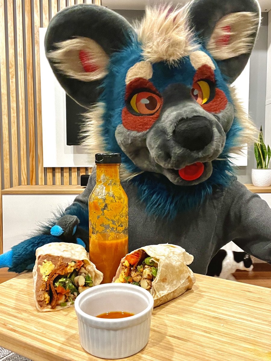 My go-to meal prep breakfast burritos are to die for, literally! (when dipped in my homemade pineapple Carolina Reaper hot sauce) #vegan #furry #breakfastburrito #atrowilddog #hotsauce #carolinarreaper #FursuitFriday