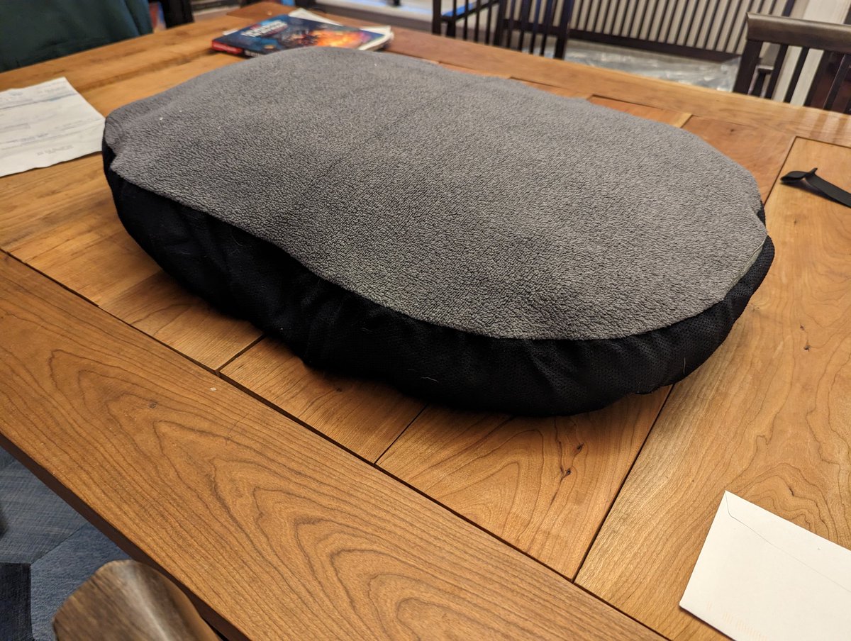 UpcycleTexStyle's tweet photo. This dog bed stuffed with old sheets and a blanket for easy cleaning is made from a recycled sweater and leftover fabric.  Good for a small or medium sized dog. #dog #bed #landfilldiverted https://t.co/5Loy7xXtWc