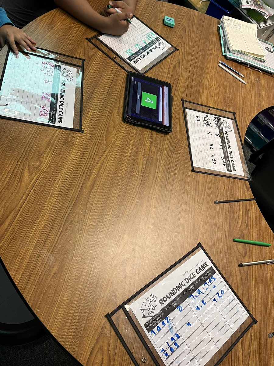 Rounding decimals was tricky this week in fifth grade so students practiced their skills with a dice game with our incredible parent volunteers! <a href="/ToppingBulldogs/">Topping Elementary</a>