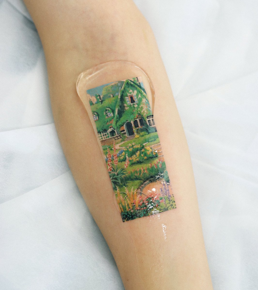 jasminericegirl's tweet image. i got my first tattoo and it's a scene from kiki's delivery service :')