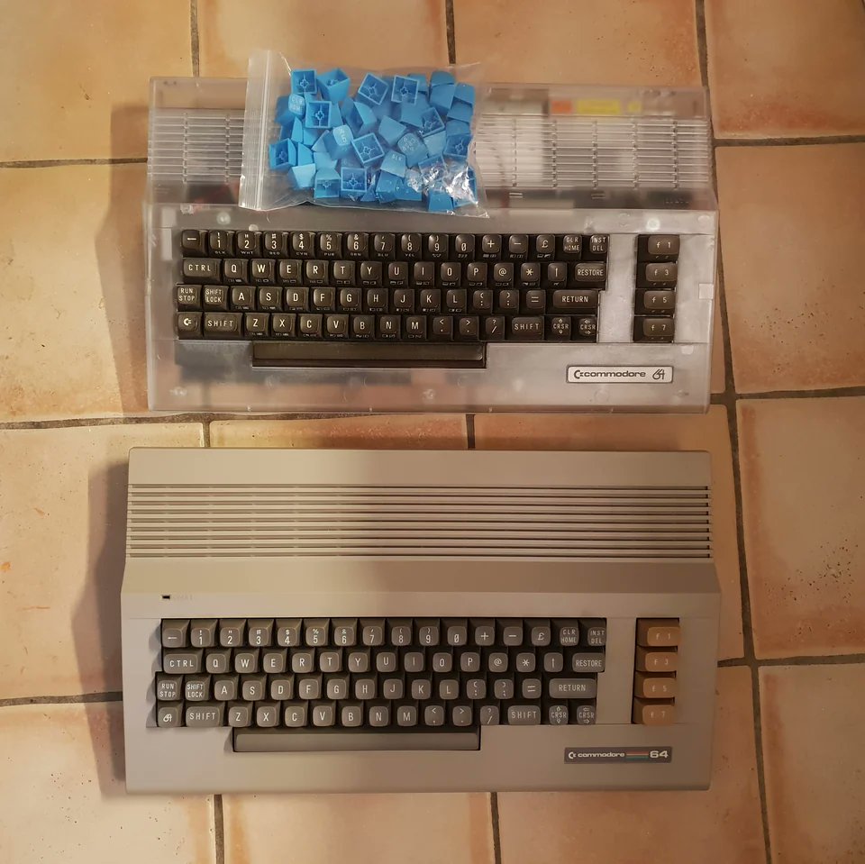 The bottom C64 is brand new on the outside, but 40 years old on the inside. I'm thinking blue keys for the transparent case?