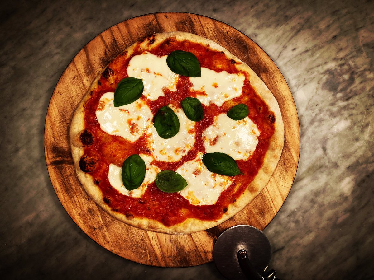 Chef Tomasso’s latest pie: Pizza Margherita. Yumsters! #cheftomasso #cheftomassospizzeria #pizza #fridaynight #pizzamargherita #homemade #basil