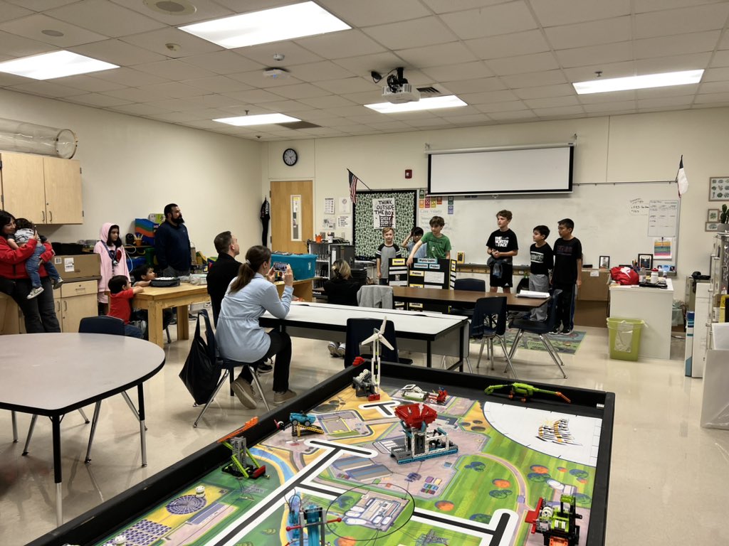 _MrsCarrera's tweet photo. The Mighty Eagles presenting their Innovation Project/Robot Design to parents and sharing their programming too. #ComalFLL https://t.co/fIrCrHWmgX