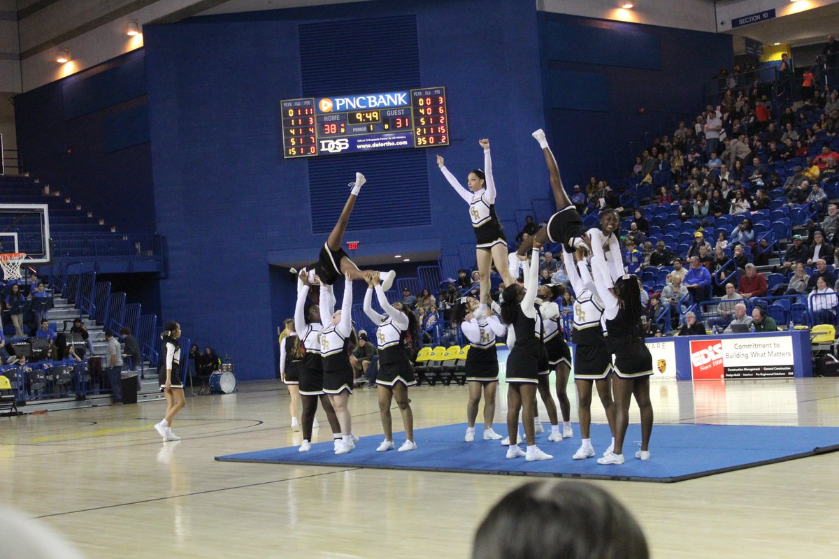 One proud admin and one equally proud mom of the photographer. George Read Cheerleaders brought down the house last night at the UD Basketball game. #grmsknights