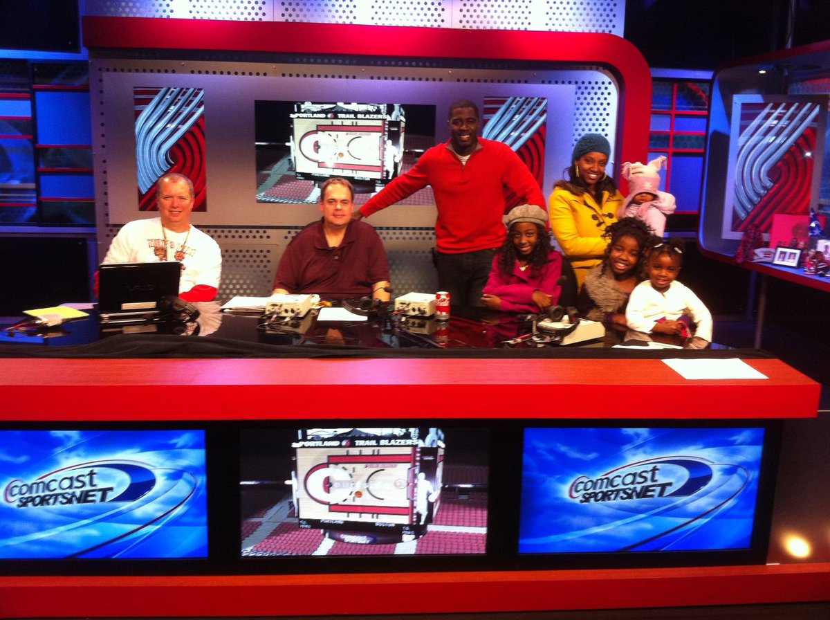 Stunned to hear passing of Big John @blazerscam4. Four decades w/ <a href="/trailblazers/">Portland Trail Blazers</a> as sideline cameraman who was on wrong end of many collisions to get the shot. My first TV appearance was through his lens in 2011, the year of this pic with John, Wheels &amp; fam. Moda won’t be the same