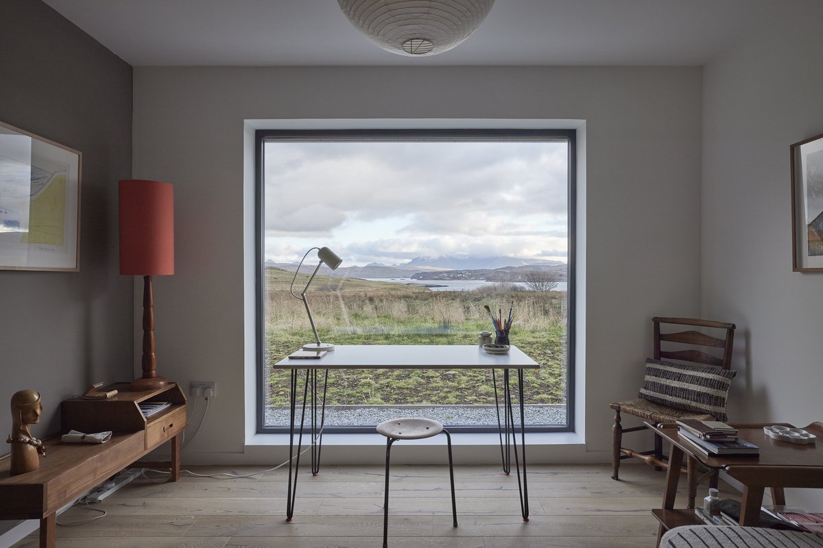 Home office with a view! 😍 Just the most perfect setup for some art inspiration. #designbuild #roomwithaview #scottishhomes #isleofskye