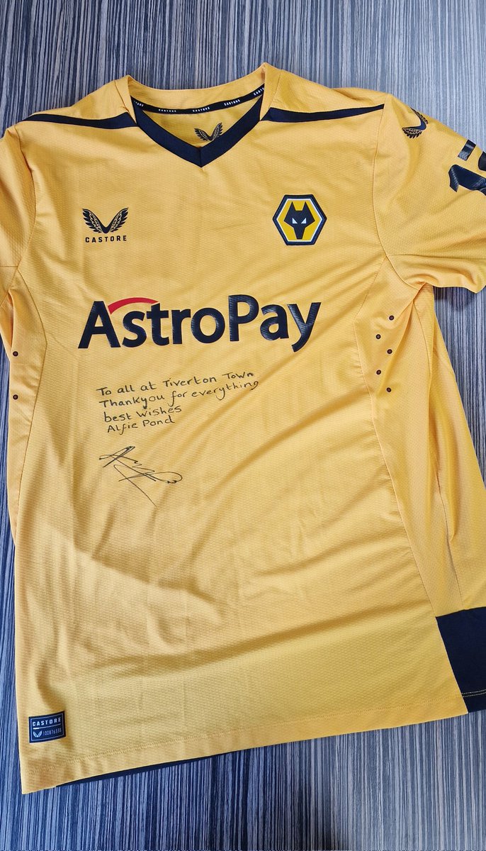 tivertontownfc's tweet photo. Thank you to @Wolves defender, and former Tivvy loanee @AlfiePond1, for donating a signed and match-worn @PapaJohnsTrophy shirt to be hung up in the Sports Bar 🤩
#OnceAYellow 💛 https://t.co/0bXI2BFAnG