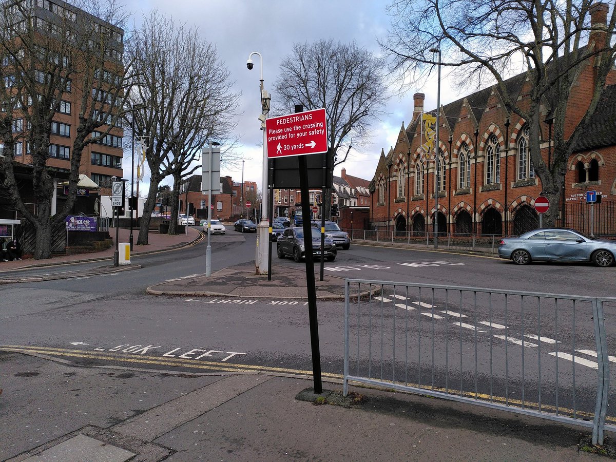 Typical of many UK towns, visiting parents in Sutton Coldfield reminds me how poor provision is for pedestrians. They've even put up a sign admitting how poor it is. Treating town centres as 'retail areas' encircled with a ring road exacerbates the problem of economic vitality.