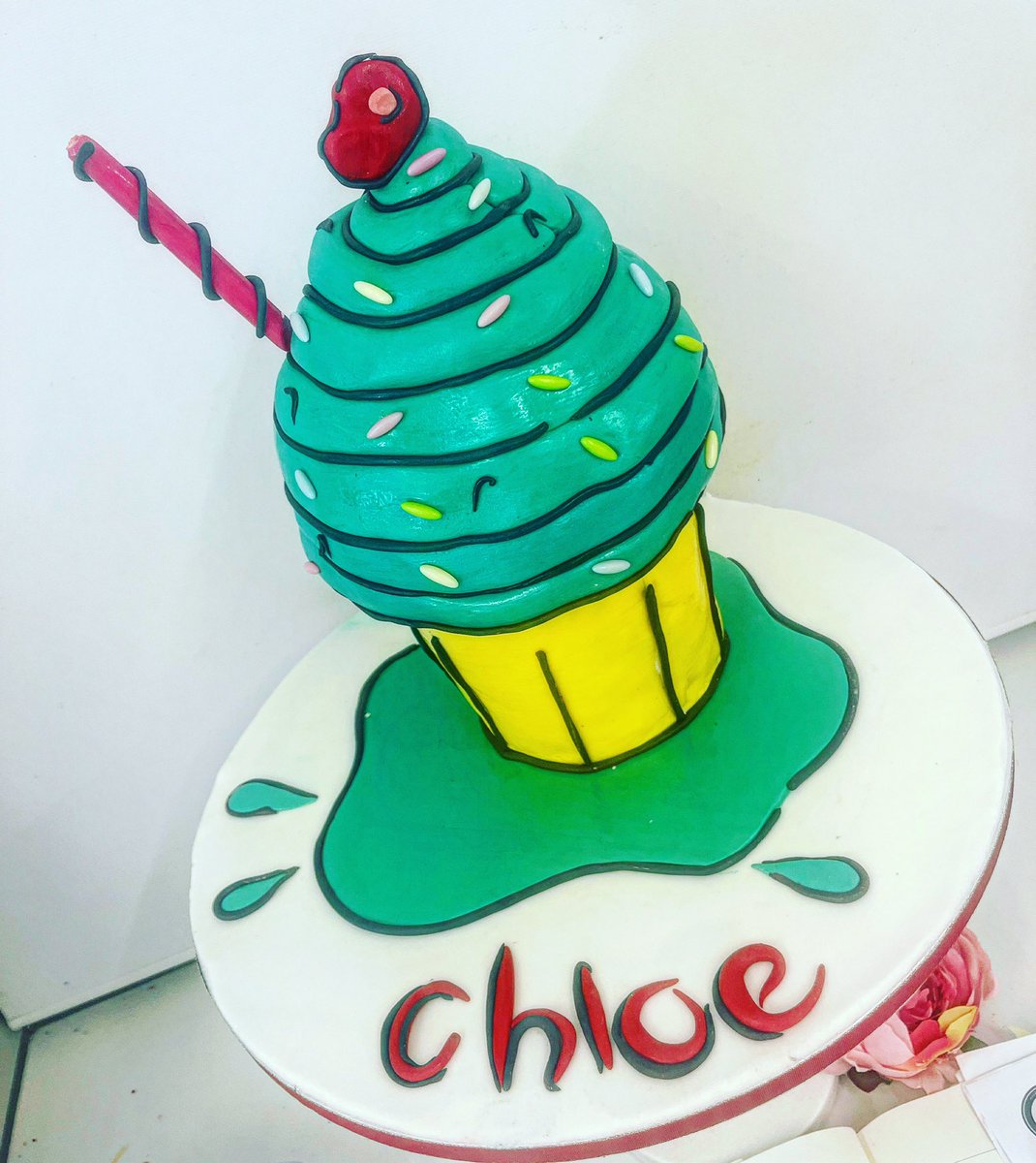 A cartoony cupcake cake