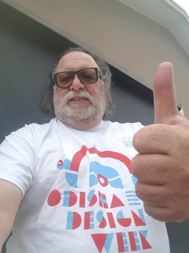 PareshCh1's tweet photo. @TheAnsumanRath @odisha_tourism Happy to see this. Similarly last year someone from Melbourne, Australia named Mark Watson @designprovidenc wearing the T-shirt of #OdishaDesignWeek. https://t.co/ZMI8r6Ac0S