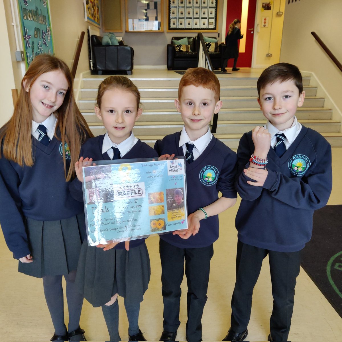 BranielPS's tweet photo. 'Bracelet Boutique' took our assembly this morning to launch their charity raffle in aid of Angel Wishes in loving memory of their friend, Poppy. Entries are £1 for children but staff were told they had no upper limit and to 'dig deep!' 😂😂 #TeamBraniel https://t.co/SpOo5EM4zq