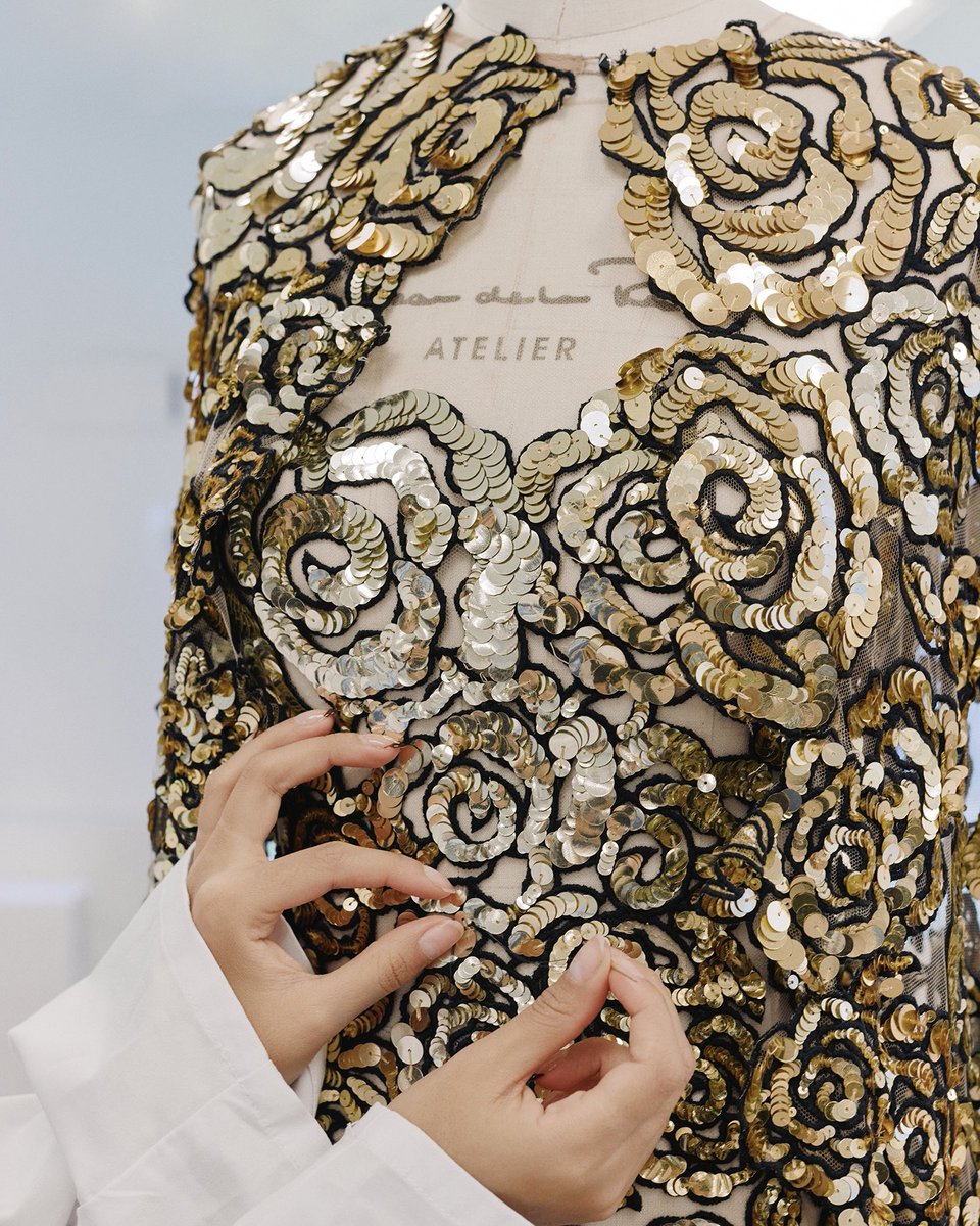 Hands at work. A glimpse at the development of the #odlrprefall2023 sequin  rosette embroidered gown and cape in our New York City atelier. Pre-order Oscar  de la Renta Pre-Fall 2023: https://t.co/QLWqXyPfLo