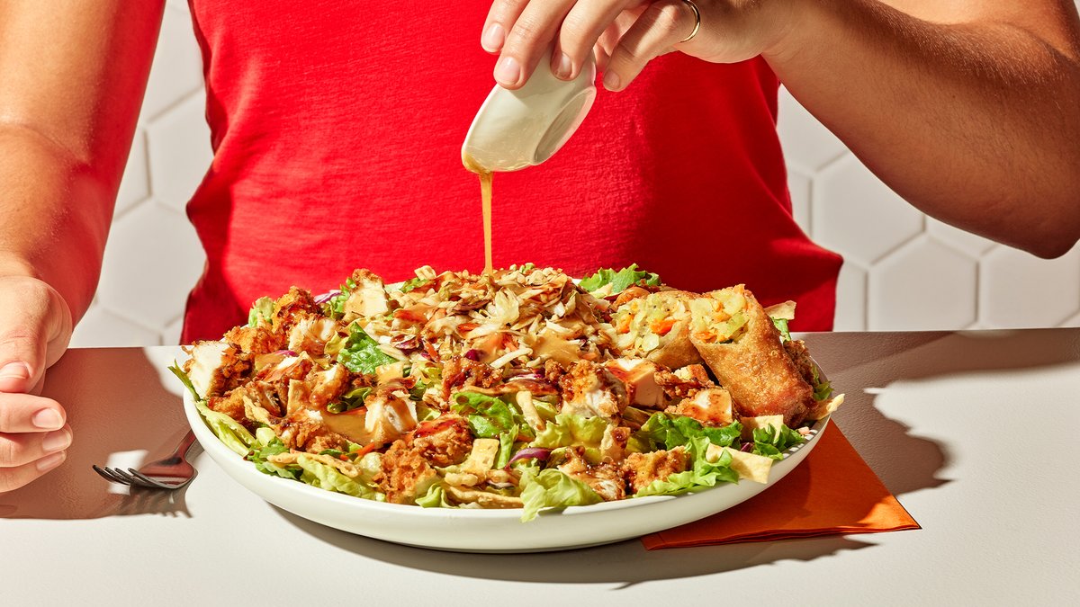 Zaxbys's tweet image. you can go ahead and add "forced Zaxby's to bring back the Asian Zensation Zalad" to your resume