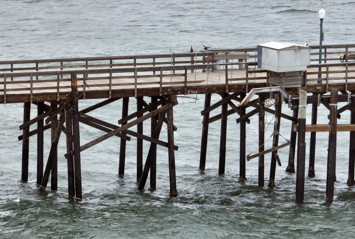 jeffgritchen's tweet photo. A boat ramp used by oil platform workers was ripped from the #SealBeach pier during last Thursday night’s #storm - other parts of the pier were also damaged. #weather #sealbeachpier @ocregister https://t.co/UruOcYDWgM