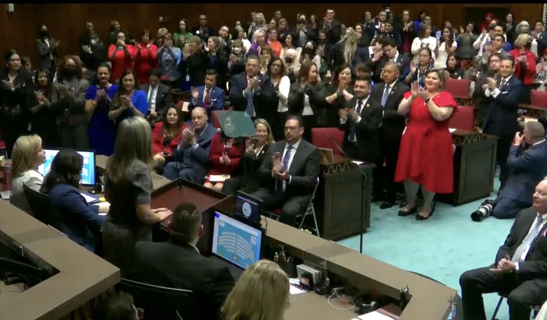 AZHouseDems's tweet photo. Standing ovation as Governor Hobbs calls out reckless expansion of private school vouchers that could “bankrupt the state,” and for her support for public school educators. “I see you, I respect you, and I will always stand up for you!” #AZSOTS https://t.co/cTnPnntg5w