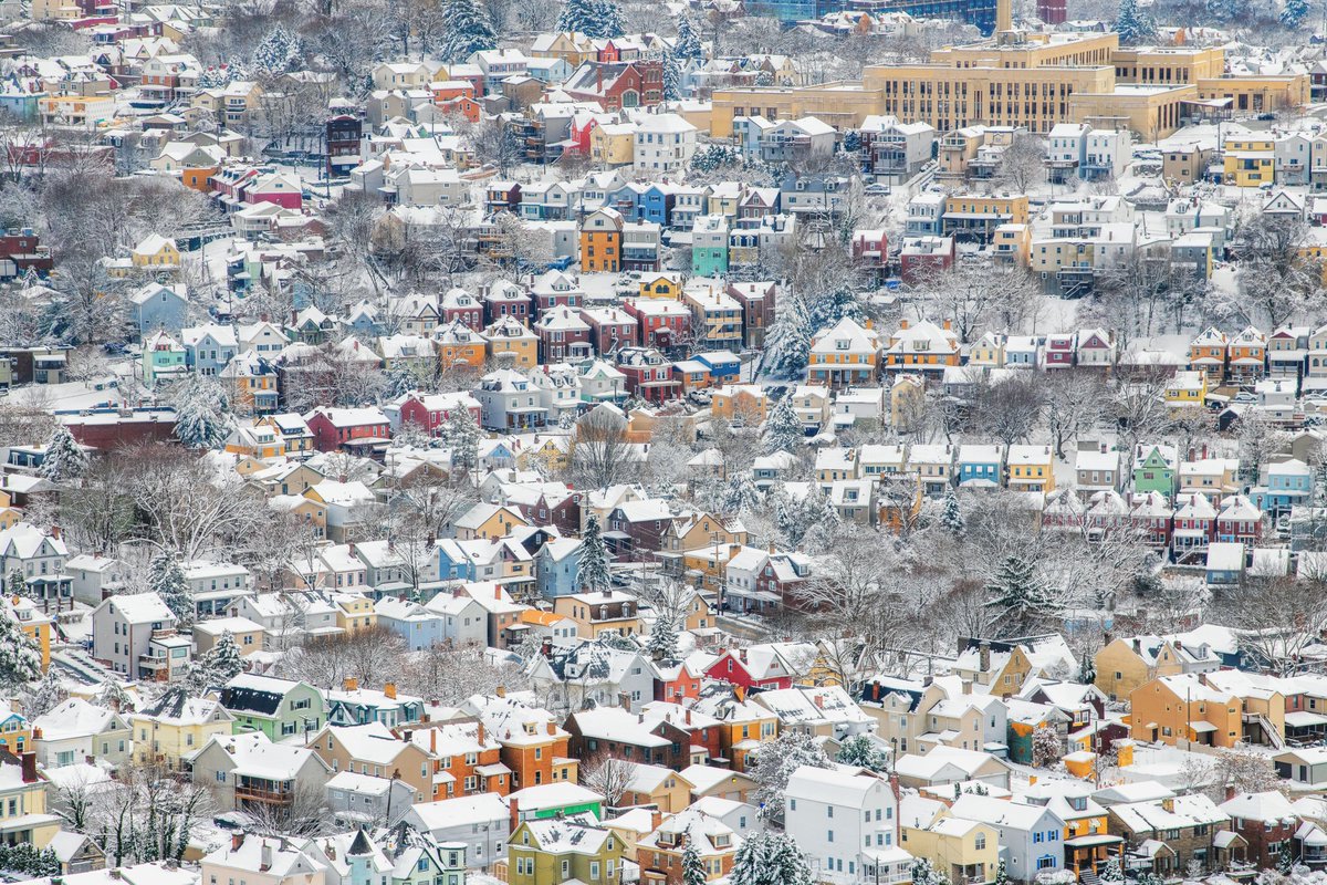 DaveDiCello's tweet photo. The houses on the South Side Slopes may get all of the attention in #Pittsburgh, but the ones on Mt. Washington are pretty picturesque after a snowfall too. This is from a helicopter flight a few years ago, and the multicolored houses stand out beautifully against the fresh snow. https://t.co/0gJvUmoZ0E