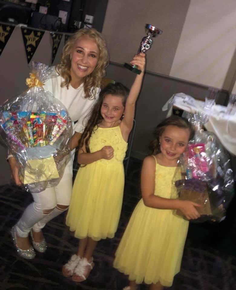 savannahkunyo's tweet photo. Family trio, back when we won the talent competition. First time all singing together https://t.co/CTucB6UdPR