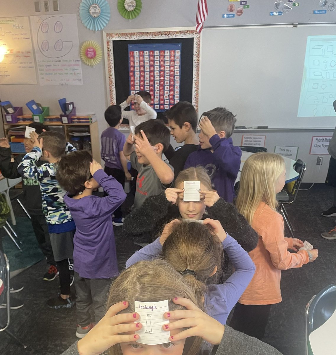 MrsDardenHLE's tweet image. These @HLEMustangs second graders are using the Lead4Ward strategy Who Am I? to practice for our vocabulary-rich geometry unit! #MathKISDMonthlyChallenge @KISDMathSquad