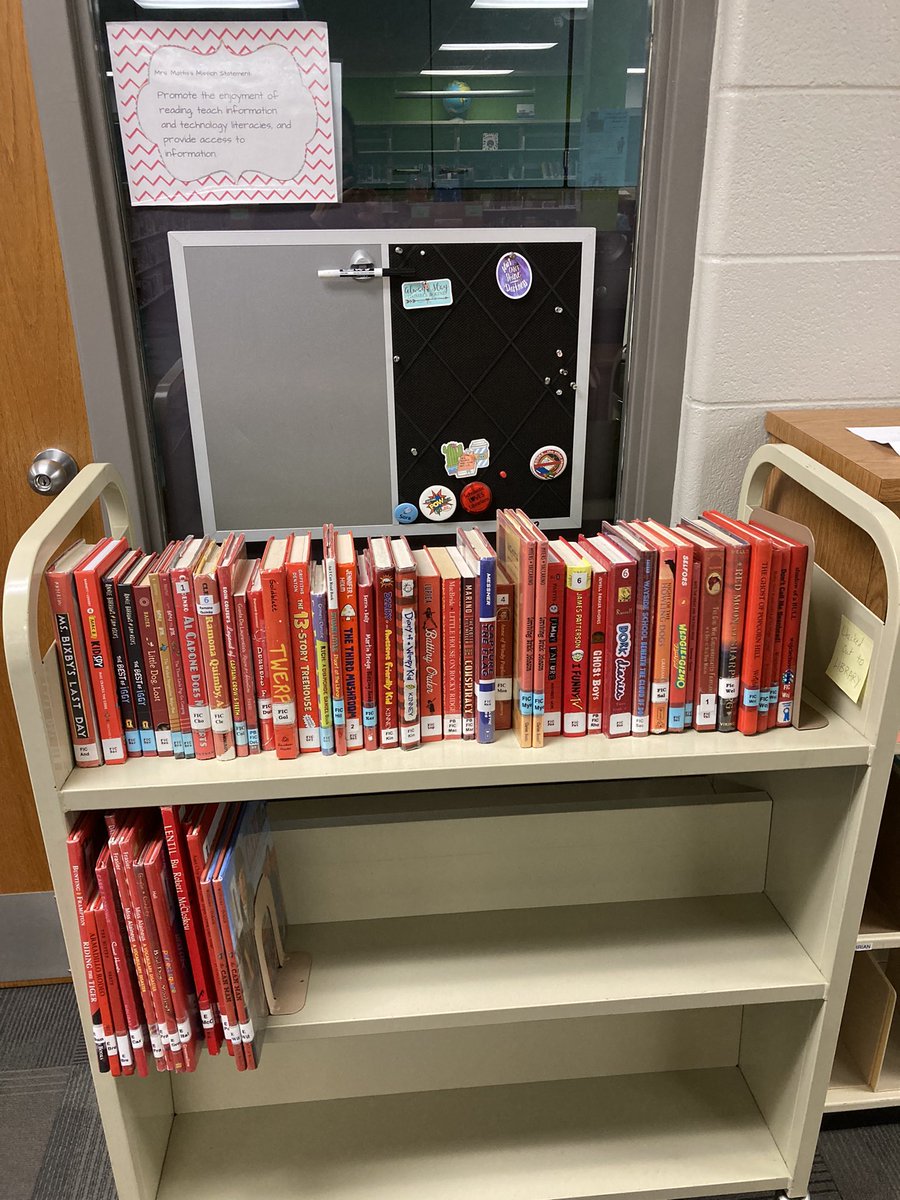 Our library clerk has been busy on this Monday! Have you “RED” any good books lately? Come check out our selection in the South Library! #r7libraries #PVE