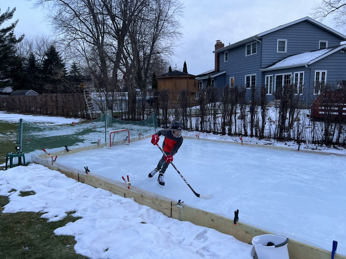 badgerhockeyfan's tweet photo. Survived the melt and back in business for at least a few days. #backyardrinks #backyardhockey #hockey #backyardicerink #backyardrink https://t.co/AzwaJTcocJ