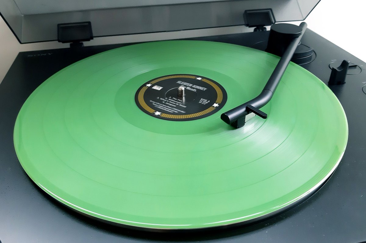 GuerillaGrrl's tweet photo. Gorgeous green Sleater Kinney vinyl gets its first play! I was gifted this album almost 20 years ago and only just got a record player 😂🤘 https://t.co/xgUFCbYiy5