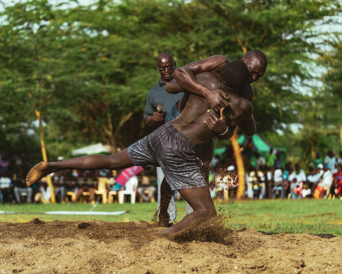 theMagunga's tweet photo. AMEN: A sport played by men and cheered on by everyone else. The idea is to put your opponent on his back. The rules are kiasi different from the wrestling you see at the Olympics. And yes, it is pronounced exactly like that.
#RusingaFestival #RusingaFest2022 https://t.co/biLTrOceyY
