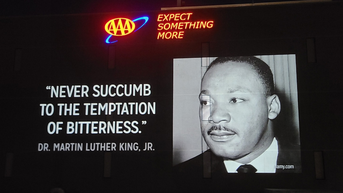 AAAWisconsin's tweet photo. As we honor the legacy of Dr. Martin Luther King, Jr., we’re projecting his words of wisdom on our Michigan headquarters and reminding ourselves that the time is always right to do what’s right for our members. #WeAreAAA https://t.co/vlJVj6C4Cj
