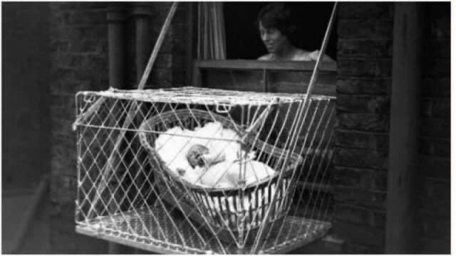 27th January 1934: An example of the wire cage which East Poplar borough council in London propose to fix to the outside of their tenement windows, so that babies can benefit from fresh air and sunshine. https://t.co/jKWwBZnrvz