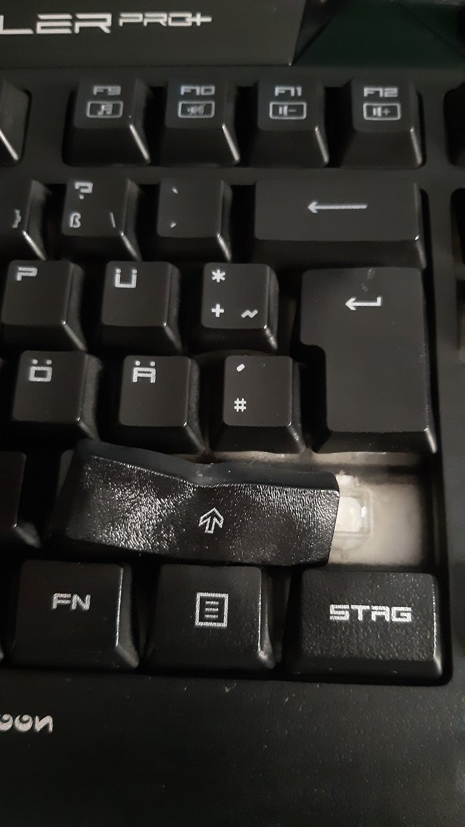 Backi_Backi's tweet photo. After I doused it with juice, cleaned it, and tried to dry it.... it looks like I burned it.

Did not know that a hair dryer is so hot 

It still works but some keys are stuck now🤡 https://t.co/eQshE0lleR
