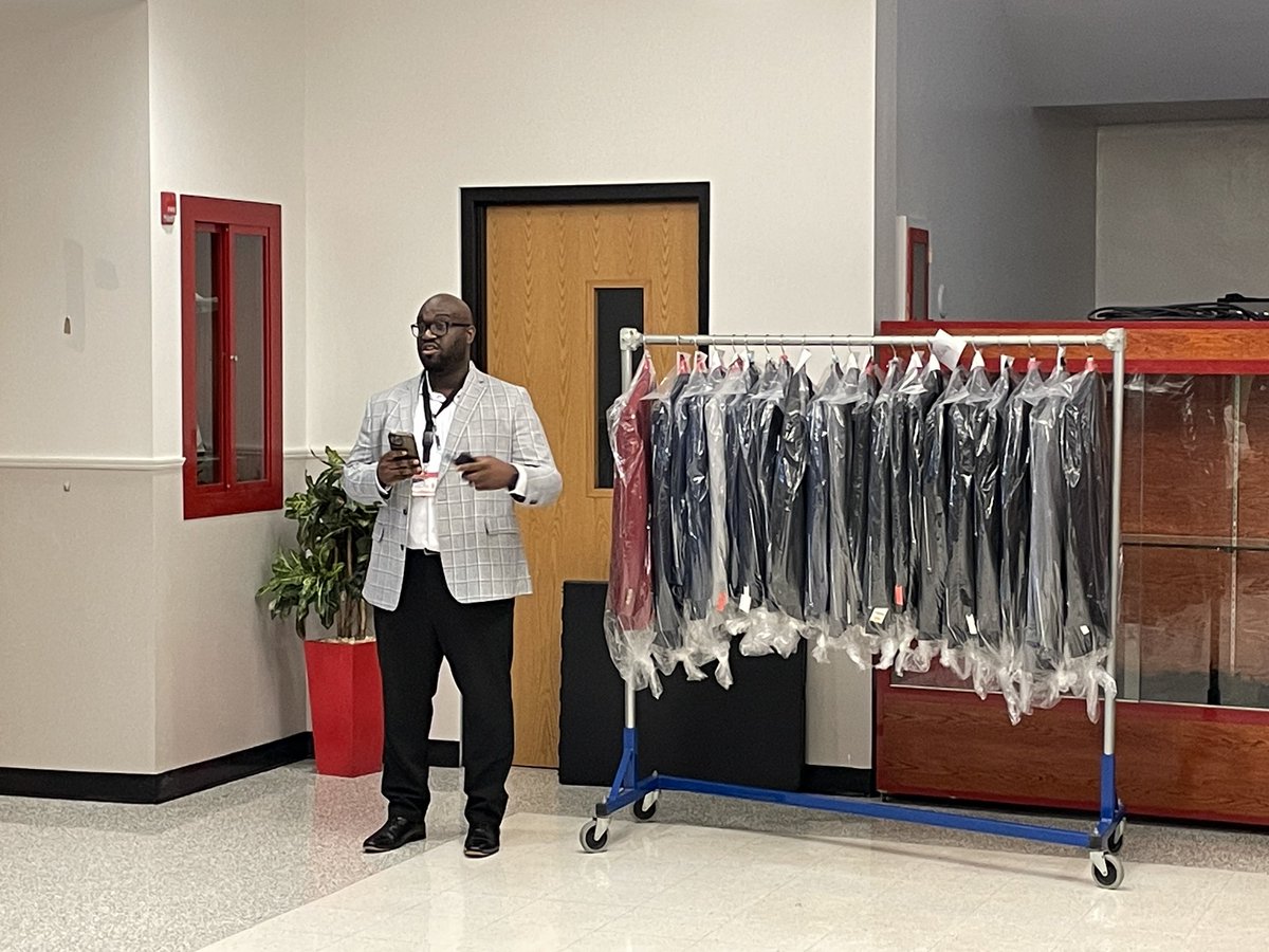 Mr. Darius presents the suits that were purchased by community members for RHS students following the “Tied to Greatness” leadership workshop last spring! #RHSBelievesInSuccess