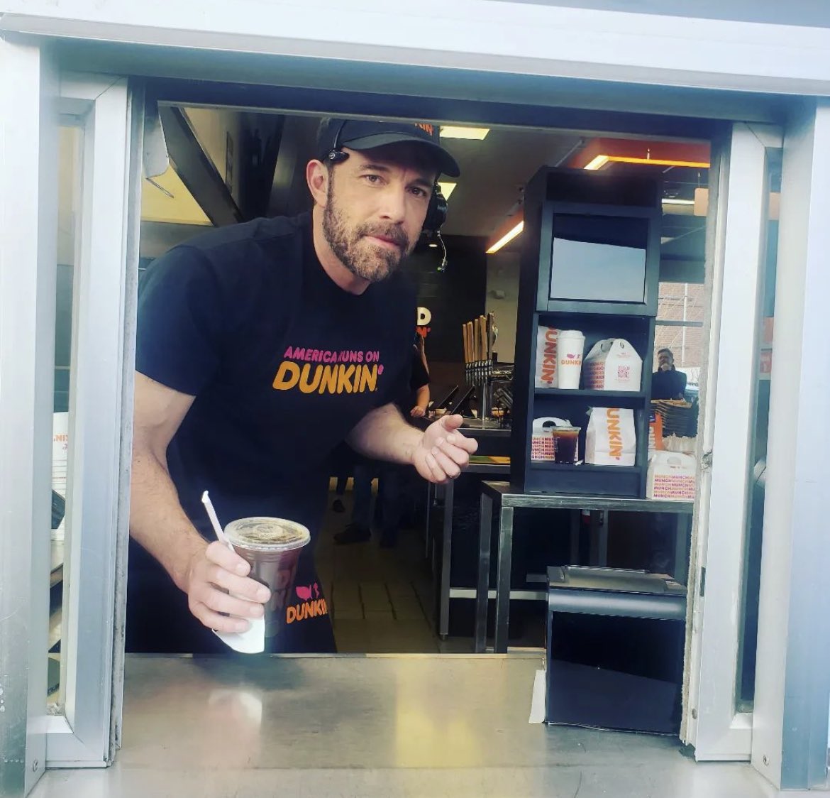 PopBase's tweet image. Ben Affleck was recently spotted working a Dunkin’ Donuts drive-thru in Massachusetts.