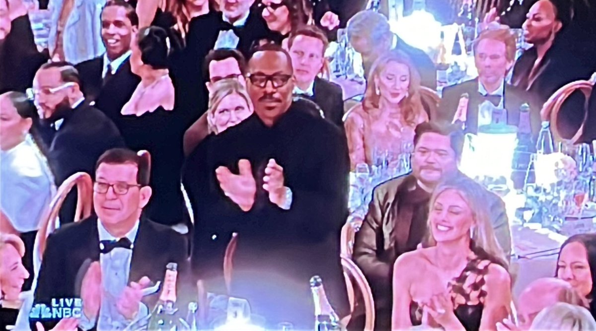 #EddieMurphy giving #TylerJamesWilliams a standing ovation on his @goldenglobes win: iconic!