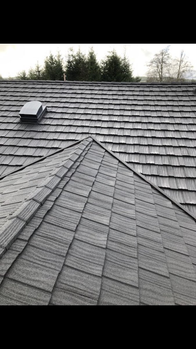 CRSRoofingInc's tweet photo. A striking roof installation using 2,600 square feet of DECRA Shake XD in Midnight Eclipse. 
All the curb appeal of a shake roof combined with the durability of metal roofing.
Who says you can't have your cake and eat it too? 
#Curbappeal https://t.co/VlvTNBHC55