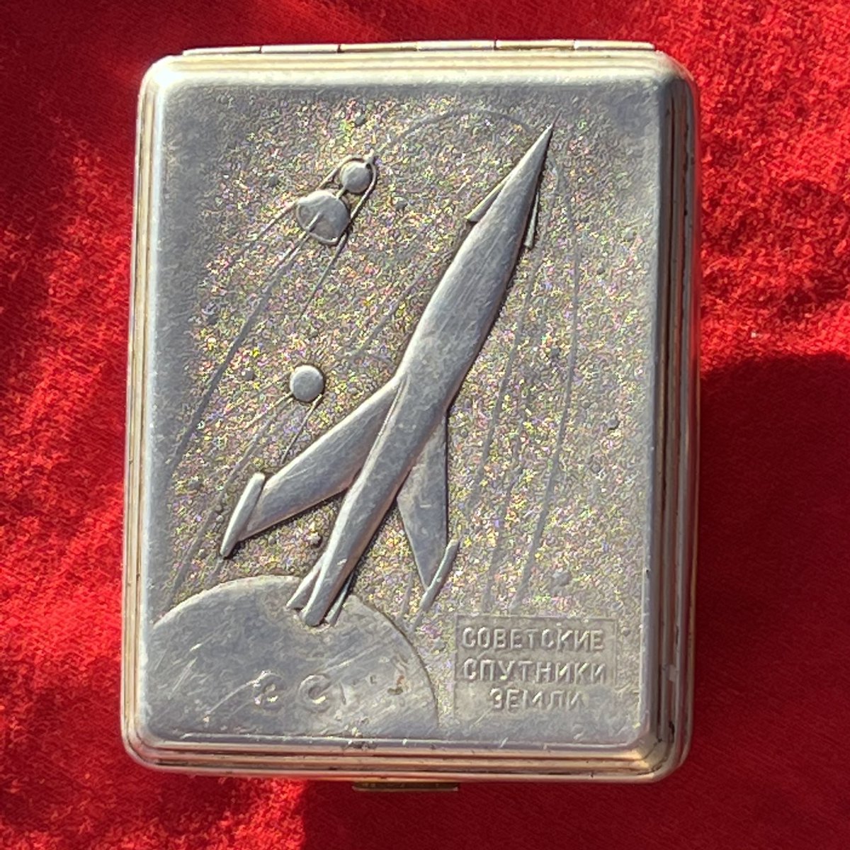 Russian, but from a vintage Etsy store in Kiev.

#ColdWar #ColdWarArtifact #cigarettecase #soviet #cccp #astro #cool #zinc #cigarettes #case #space