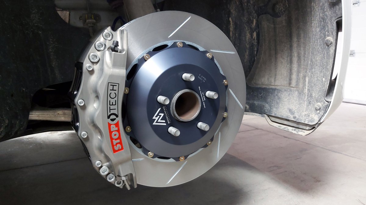 MountainPassEV's tweet photo. Designed in-house, this Big Brake Kit for the Model 3 uses StopTech STR-60 Calipers paired with your choice of either 368 or 380mm two-piece, directional rotors. Perfect for the Street, perfect for the Track!
#Tesla #Model3 #BBK #StopTech #EV #Brakes https://t.co/NIJFOZP4pa