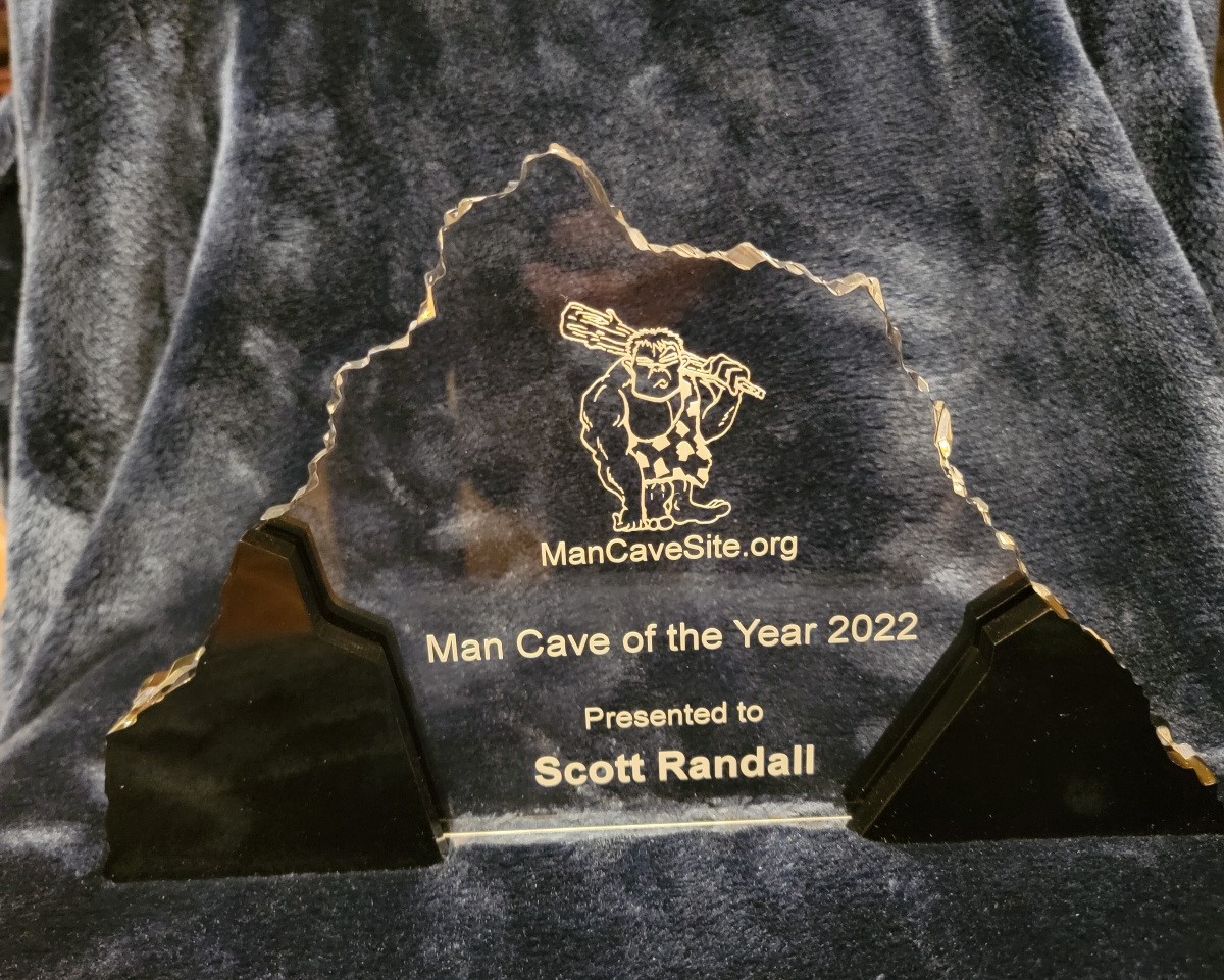 Looks like someone has a gift on the way!  Congratulations Scott for winning the 2022 Man Cave of the Year!