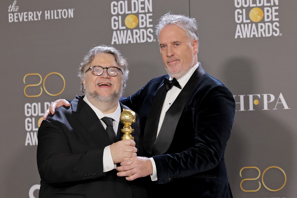 'GUILLERMO DEL TORO'S PINOCCHIO' WINS GOLDEN GLOBE

Filmmaker Guillermo del Toro and Mark Gustafson pose with the award for Best Animated Feature for "Guillermo del Toro's Pinocchio" during the 80th Annual Golden Globe Awards.

📸 Getty Images via AFP/Amy Sussman