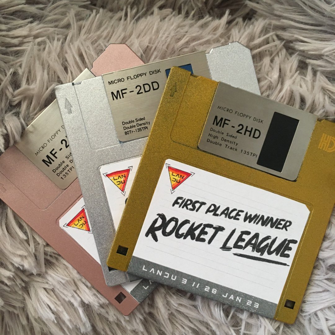 LANduAU's tweet photo. Save icon or LANdu "medal" ? 🤔
Prepping for LANdu #3 has been... fun :) Come hangout with us and play games, maybe you'll win one of these neato floppy disks! 🔥
#LANdu #LANdu3 https://t.co/732DYWu0rL
