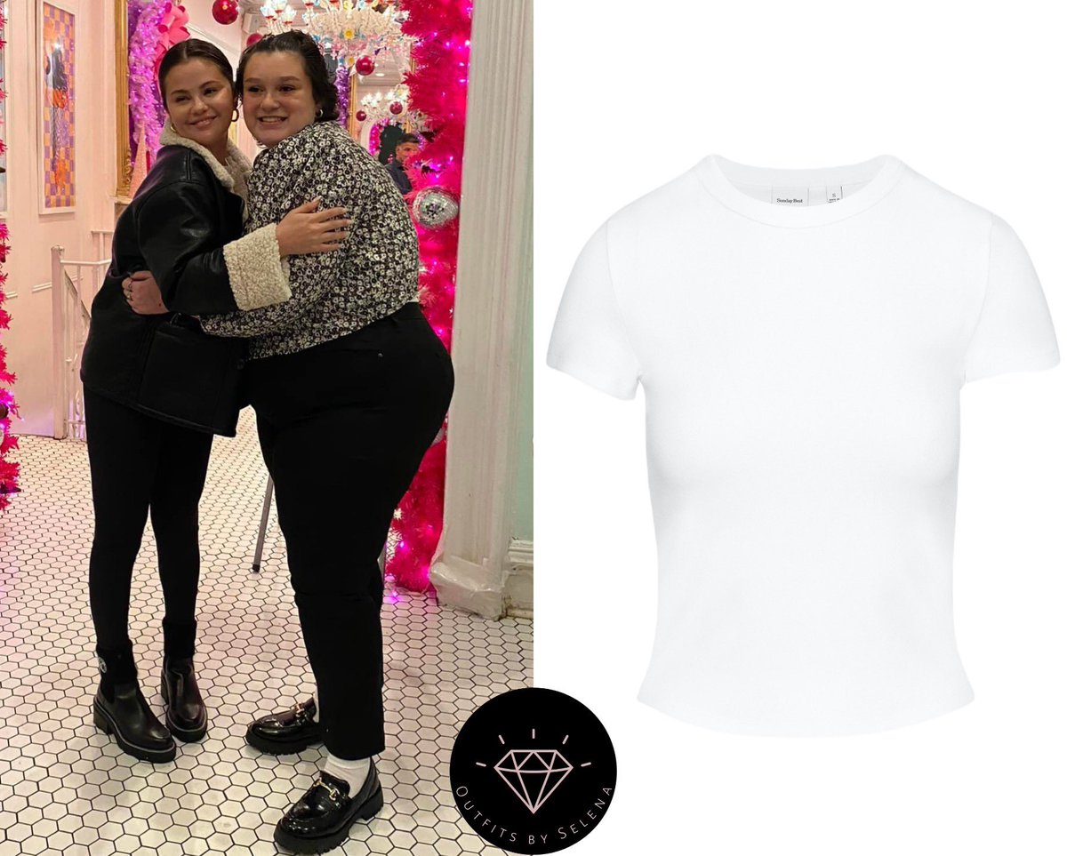 outfitsbyselena's tweet photo. January 4, 2023 - .@SelenaGomez with fans with Make-A-Wish at Serendipity 3 in New York, NY
#SelenaGomez wearing a #SundayBest Little Ribbed Hip T-Shirt ($30) with #TnAction TnaButter Atmosphere Hi-Rise Leggings ($68) and @FreePeople We The Free Kaja Vegan Bonded Peacoat ($248). https://t.co/zkLF11Mbuv