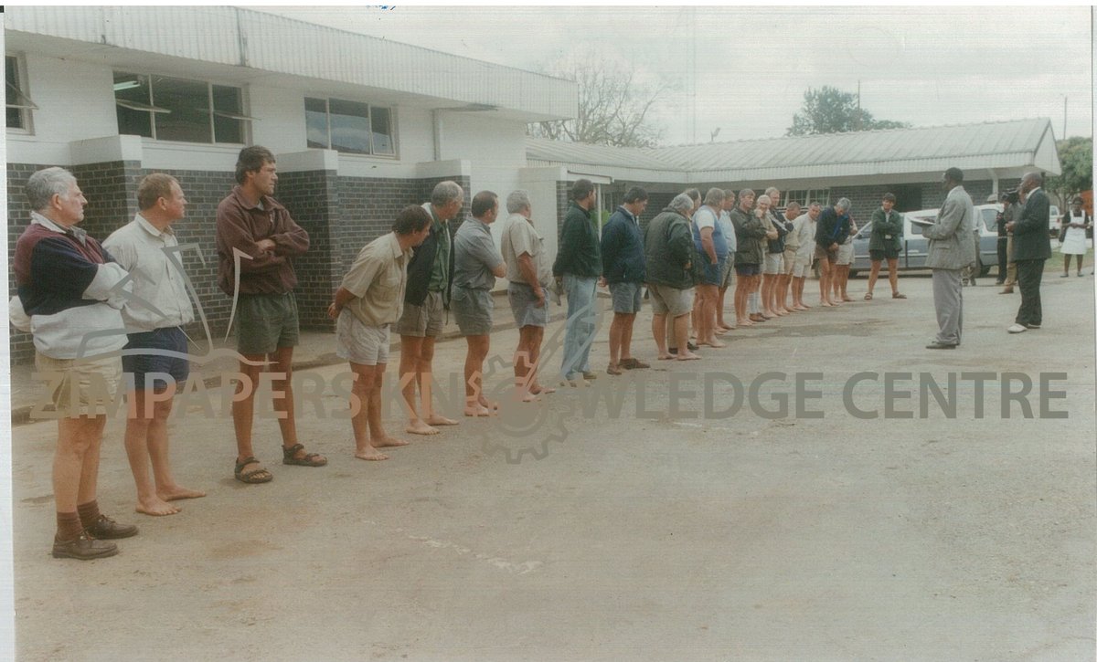 Zimpapers Knowledge Centre (@zimpaperscentre) on Twitter photo #LandReform
The 22 commercial farmers who allegedly had beaten up resettled farmers at a farm in Chinhoyi during the Land Reform exercise stand at an identification parade at Chinhoyi police station.
Date:07 August 2001
📸 Regis Nyandima
Source;<a href="/ZimpapersCentre/">Zimpapers Knowledge Centre</a> #LandReform
The 22 commercial farmers who allegedly had beaten up resettled farmers at a farm in Chinhoyi during the Land Reform exercise stand at an identification parade at Chinhoyi police station.
Date:07 August 2001
📸 Regis Nyandima
Source;<a href="/ZimpapersCentre/">Zimpapers Knowledge Centre</a>