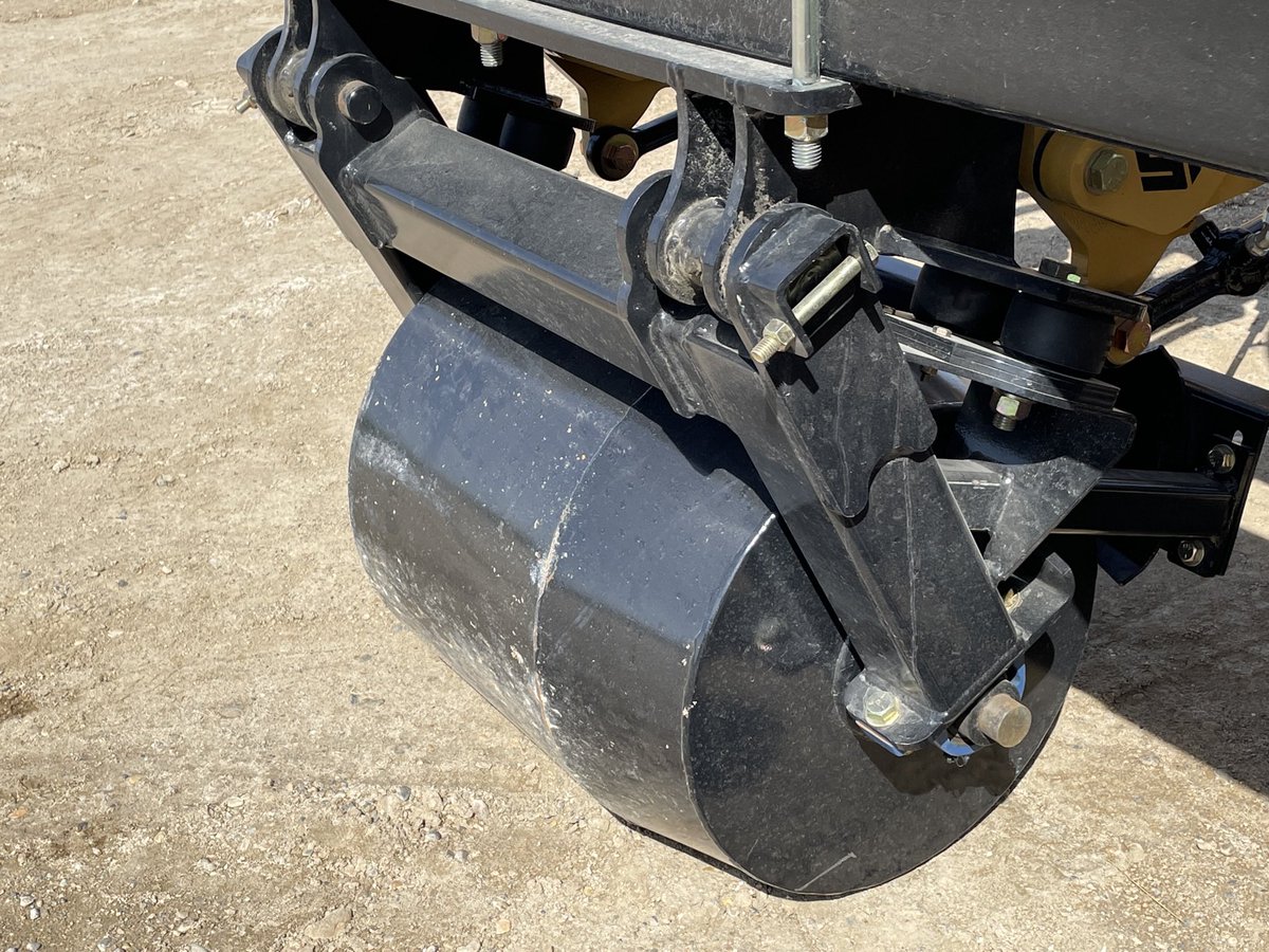 SeedMasterMfg's tweet photo. A common question we get asked about the #UltraSR: “What’s with the steel drum on the wing?” The tapered, custom design allows us to tuck a perfectly sized “wheel” under the beam that does not leave a berm in the field when cornering. A common sense solution. See it at @WCCPS_SK https://t.co/hc0KkzmEIj