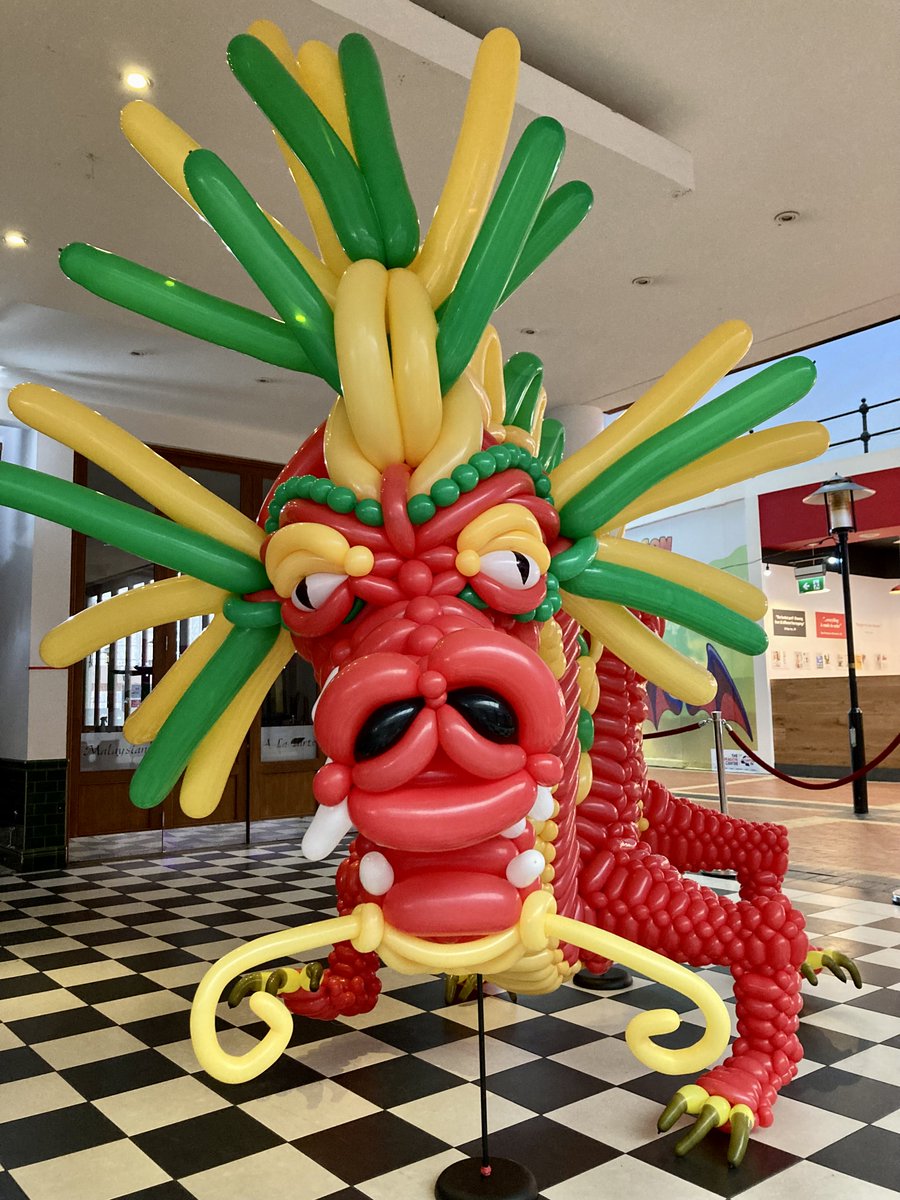 It's wet outside but it's all toasty in the <a href="/RedDragonCentre/">TheRedDragonCentre</a> thanks to the arrival of this firecracker created by <a href="/DoctorbobBU/">doctor bob BALLOONS</a>🤩🔥
The countdown to our #ChineseNewYear celebrations is officially on!  This fiery chap just needs a name - any ideas?🤔
More👉 bit.ly/3Ztl5pn