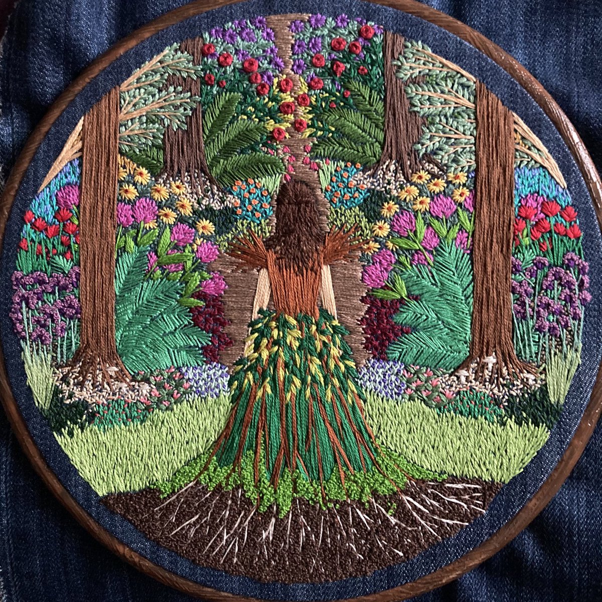 Gtilleymatthews's tweet photo. My first embroidery of 2023 is finally completed! Though I would like to stay lost in it for a while longer… I may just stare at it and dream! 😊🧵🌿🌺 
*completely freehand stitched onto upcycled denim. No patterns or paint just threads 🪡 #stitchedart #thesewingsongbird https://t.co/qQ3OHW8ZSZ