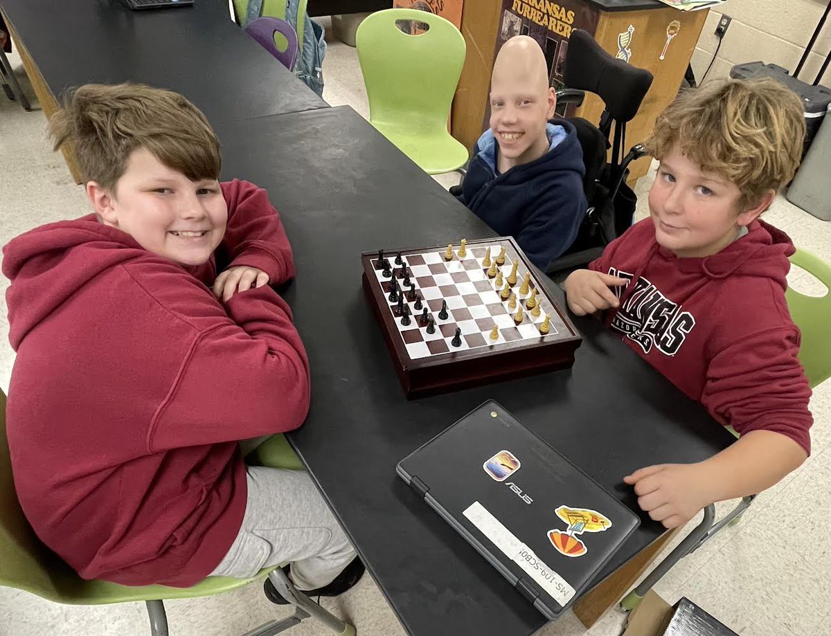 Mrs. Bandy shares her favorite photo of the day~Ethan and Douglas showing Dalton how to play chess.  #BobcatsCARE